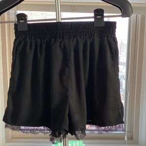 Black shorts, lace trim